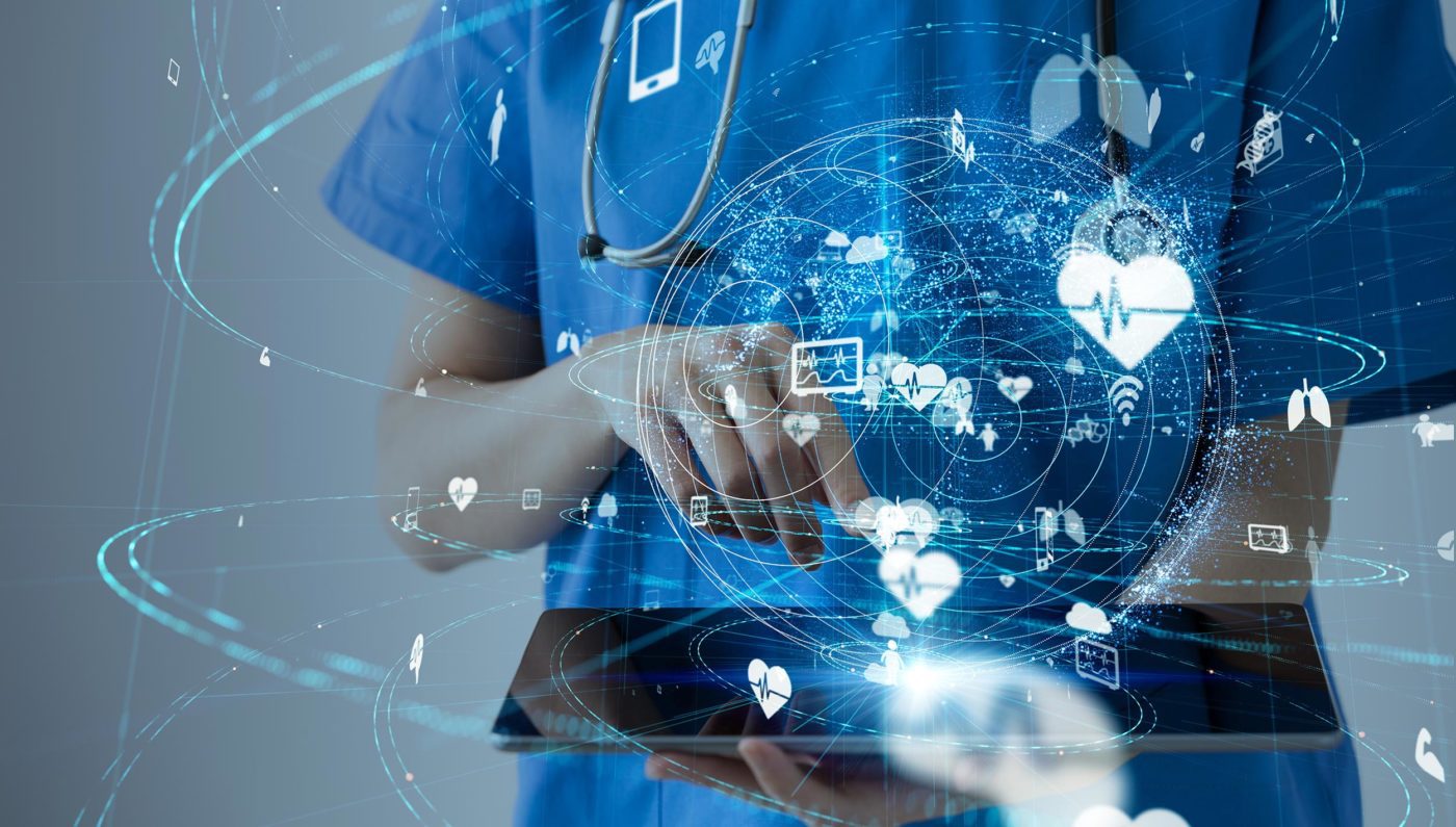 Image of a doctor holding a tablet